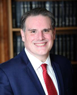 Headshot of attorney Michael Pollock